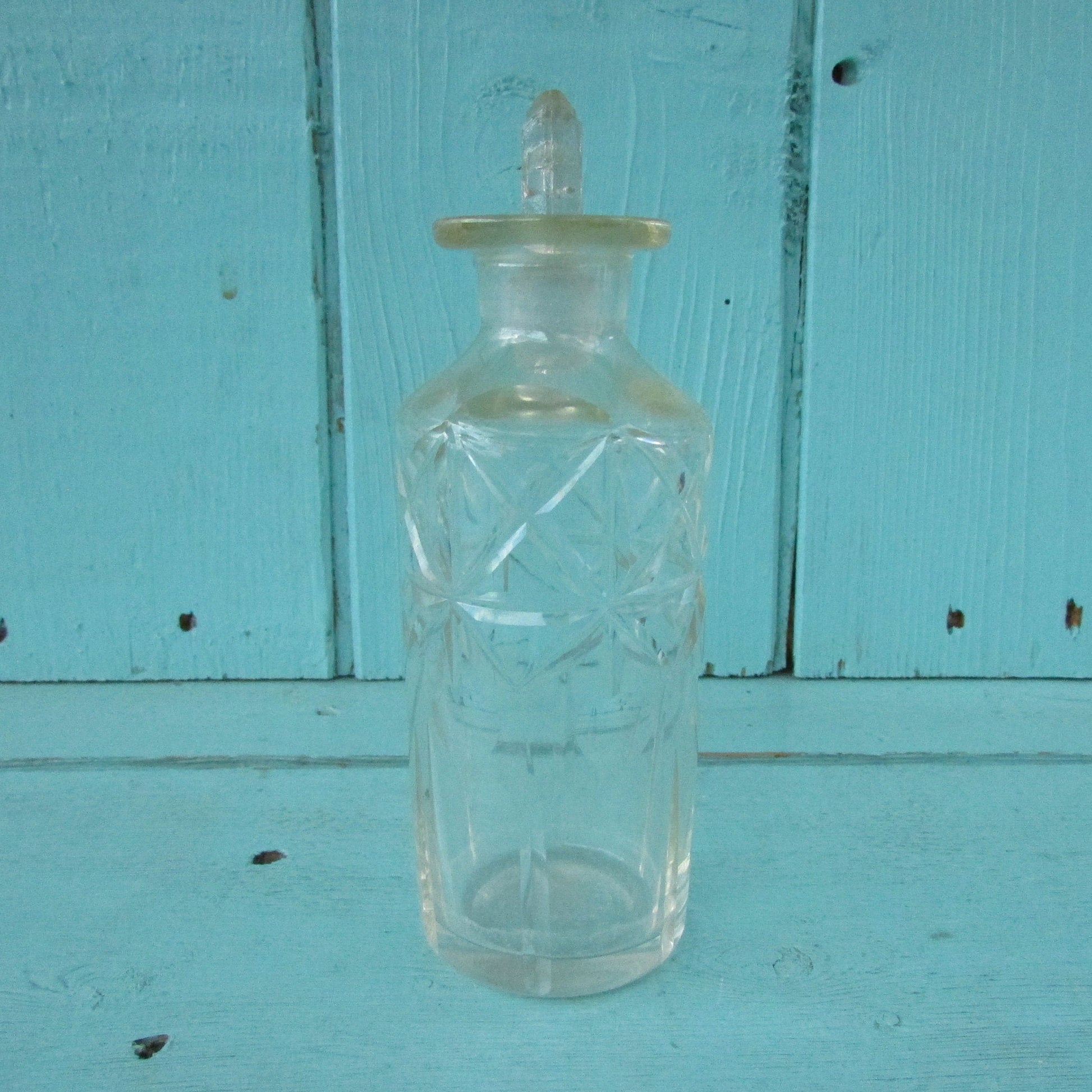 Vintage miniature cut glass perfume bottle with stopper