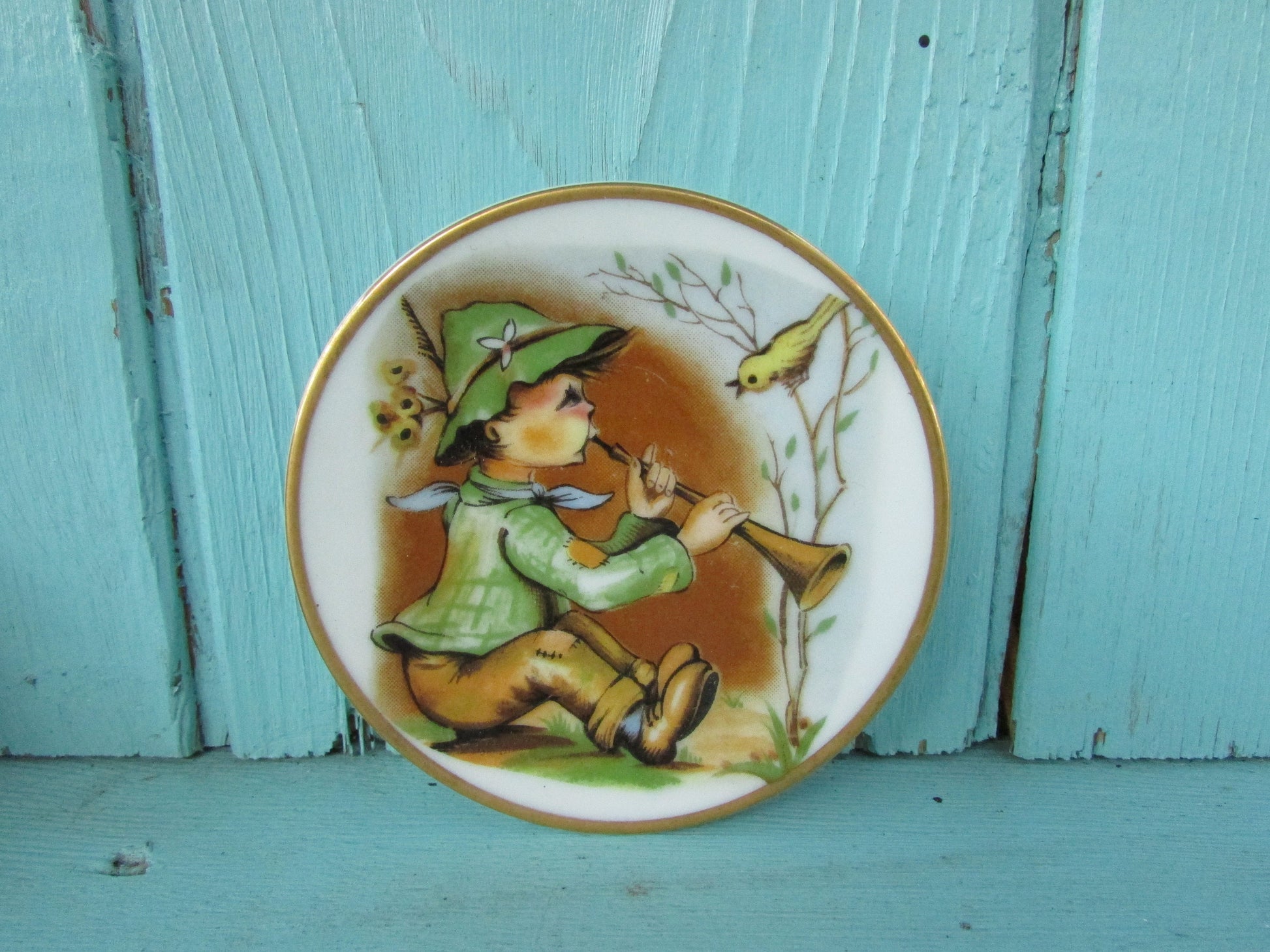 Pair of cute vintage Heidi & Peter miniature art plates with gilt edging