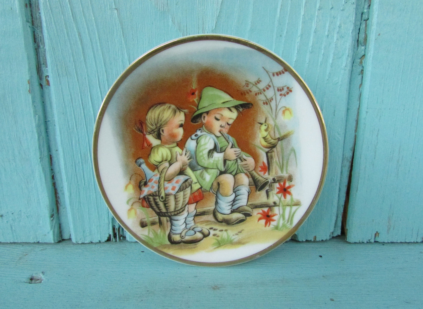 Pair of cute vintage Heidi & Peter miniature art plates with gilt edging