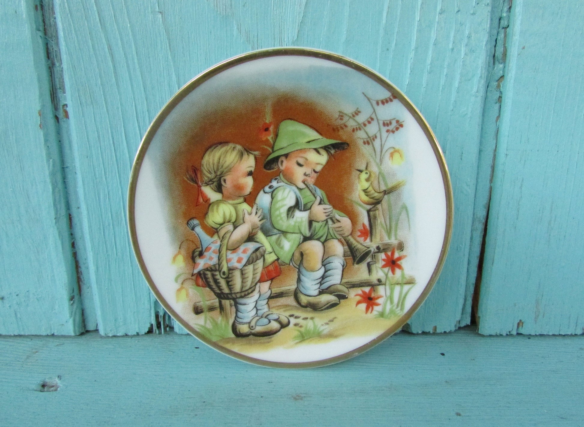 Pair of cute vintage Heidi & Peter miniature art plates with gilt edging