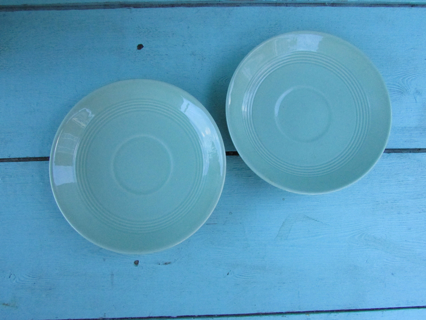 Two 1940s Wood's Ware Beryl green teacups and saucers