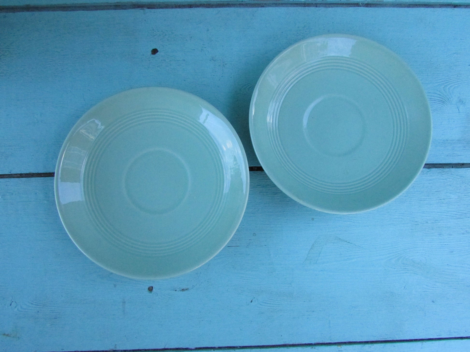 Two 1940s Wood's Ware Beryl green teacups and saucers