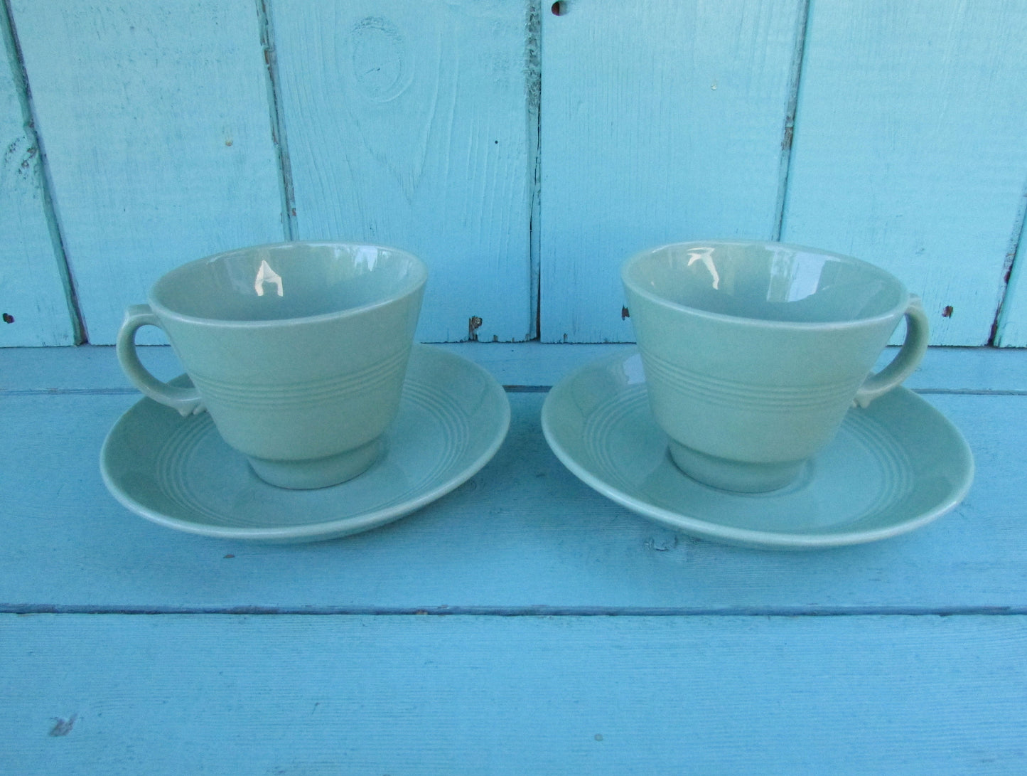 Two 1940s Wood's Ware Beryl green teacups and saucers