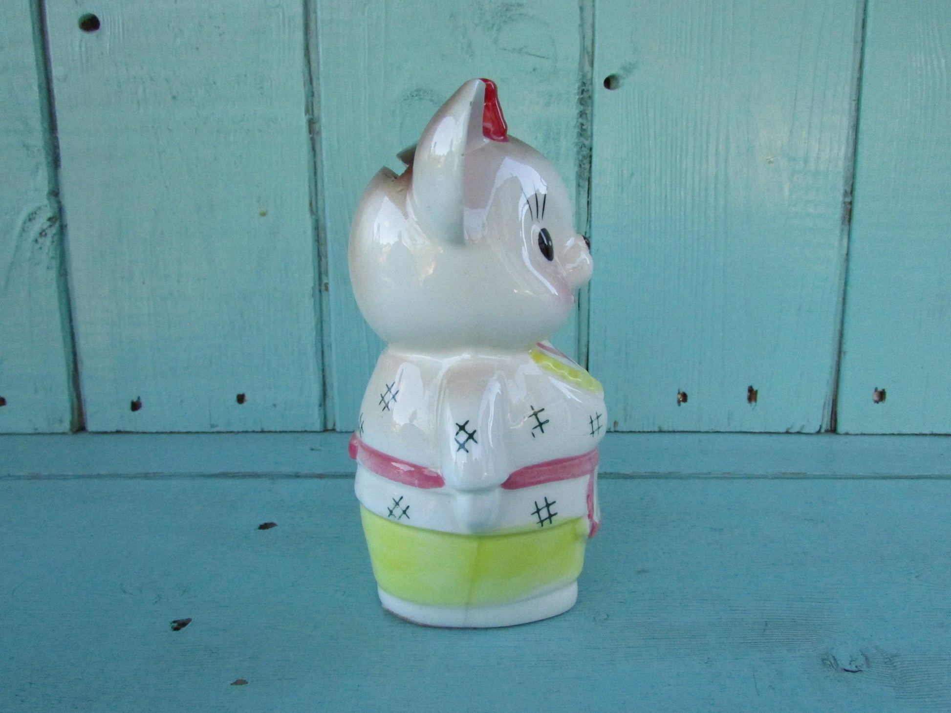 Vintage ceramic dog money box, with red hair bow detail, marked Foreign