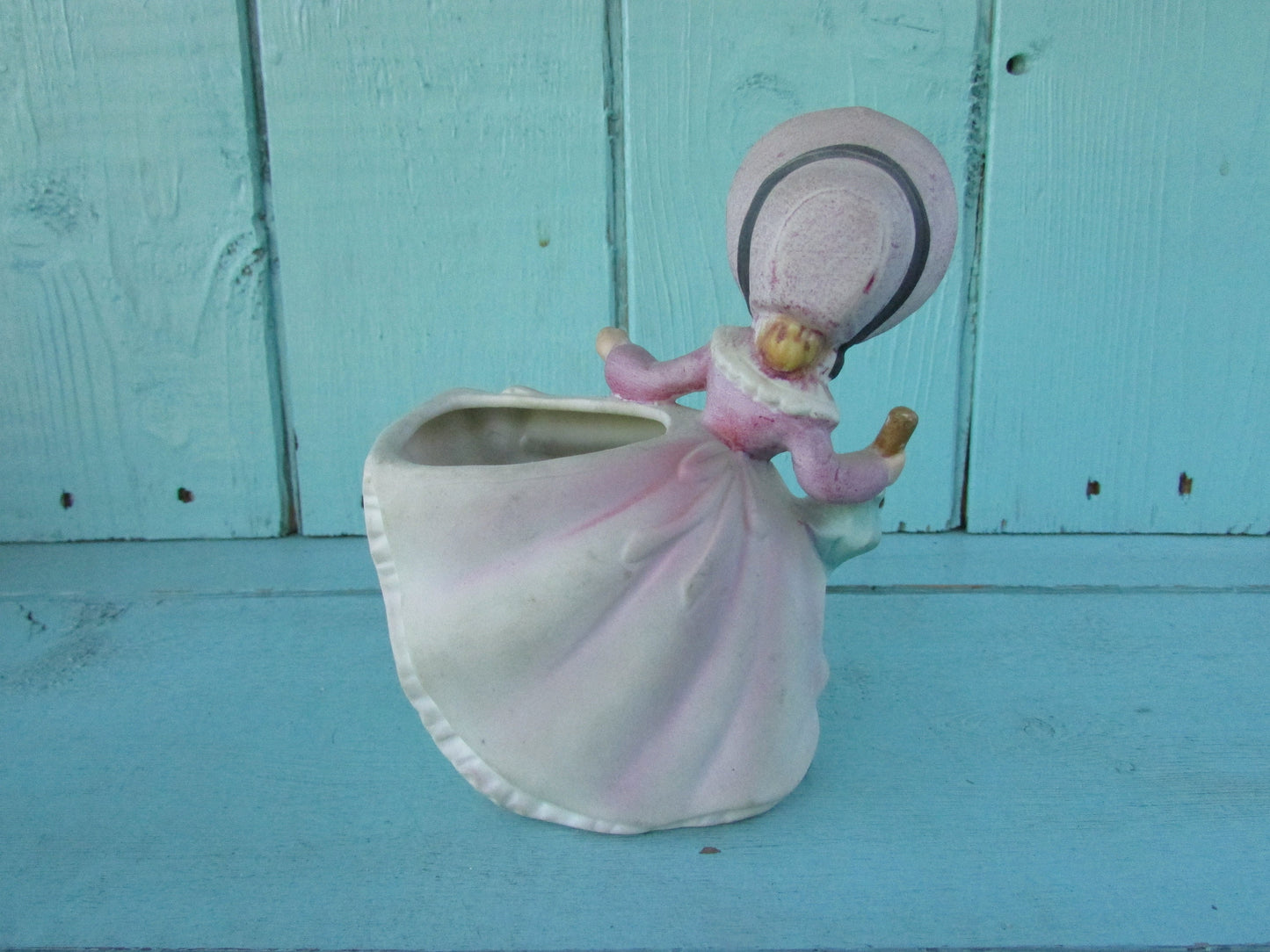 1960s Napco-style porcelain doll in bonnet with green parasol planter, marked Foreign