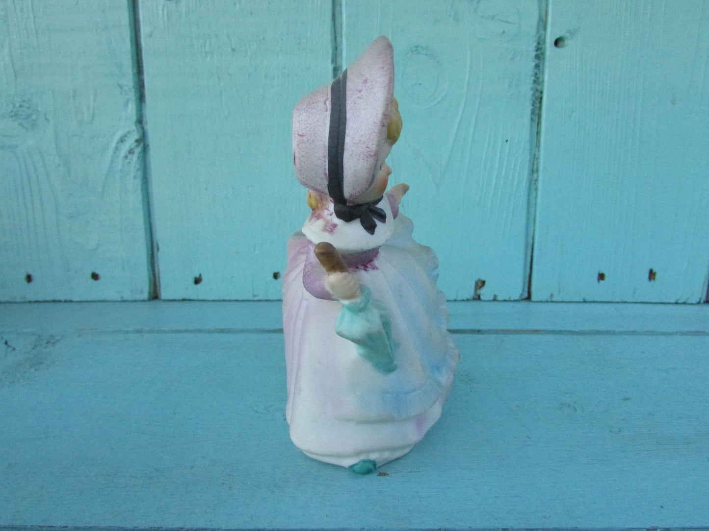 1960s Napco-style porcelain doll in bonnet with green parasol planter, marked Foreign