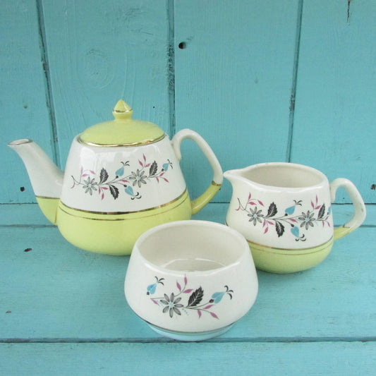 Mismatched 1950s Keele Street Pottery 'Talk of the Town' tea-for-one set