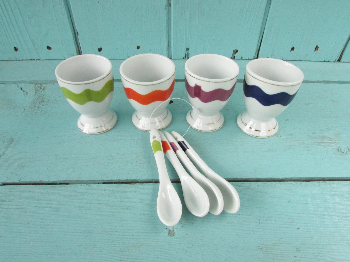 Vintage Motivex salt & pepper set and matching egg cups with coordinating ceramic spoons