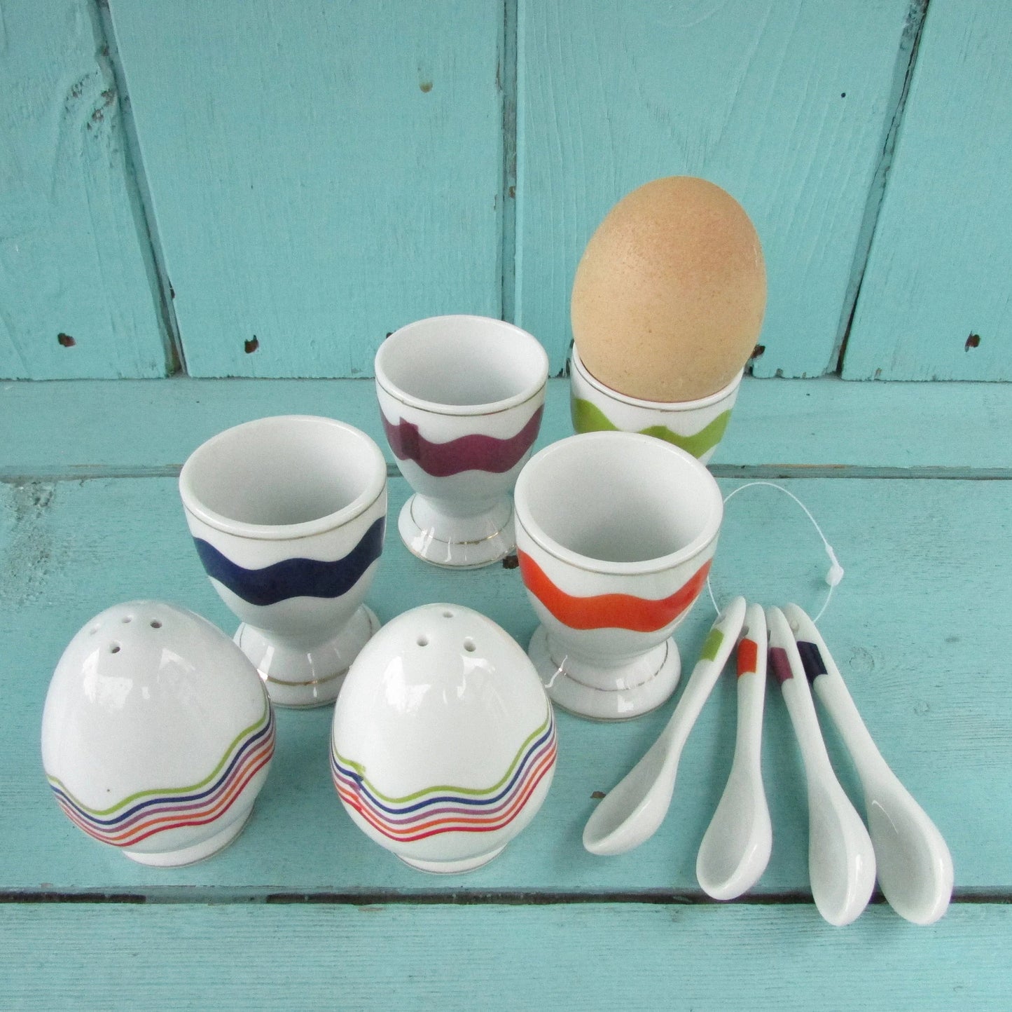Vintage Motivex salt & pepper set and matching egg cups with coordinating ceramic spoons