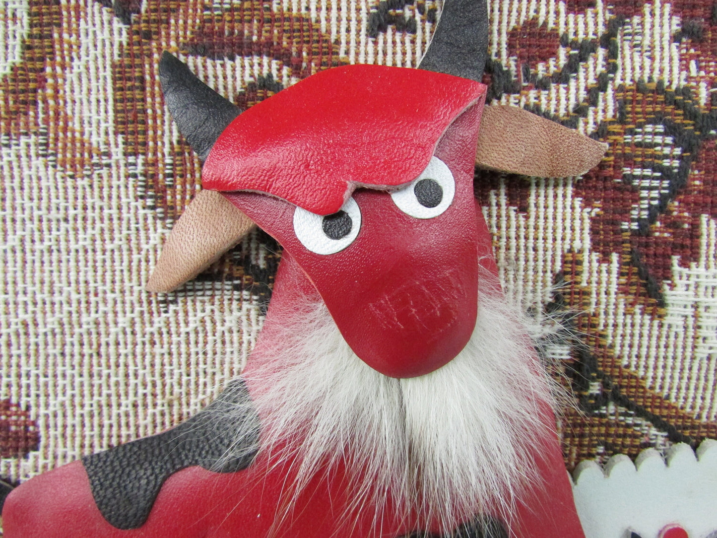 Kitsch vintage hand-crafted metal & fabric bull collage