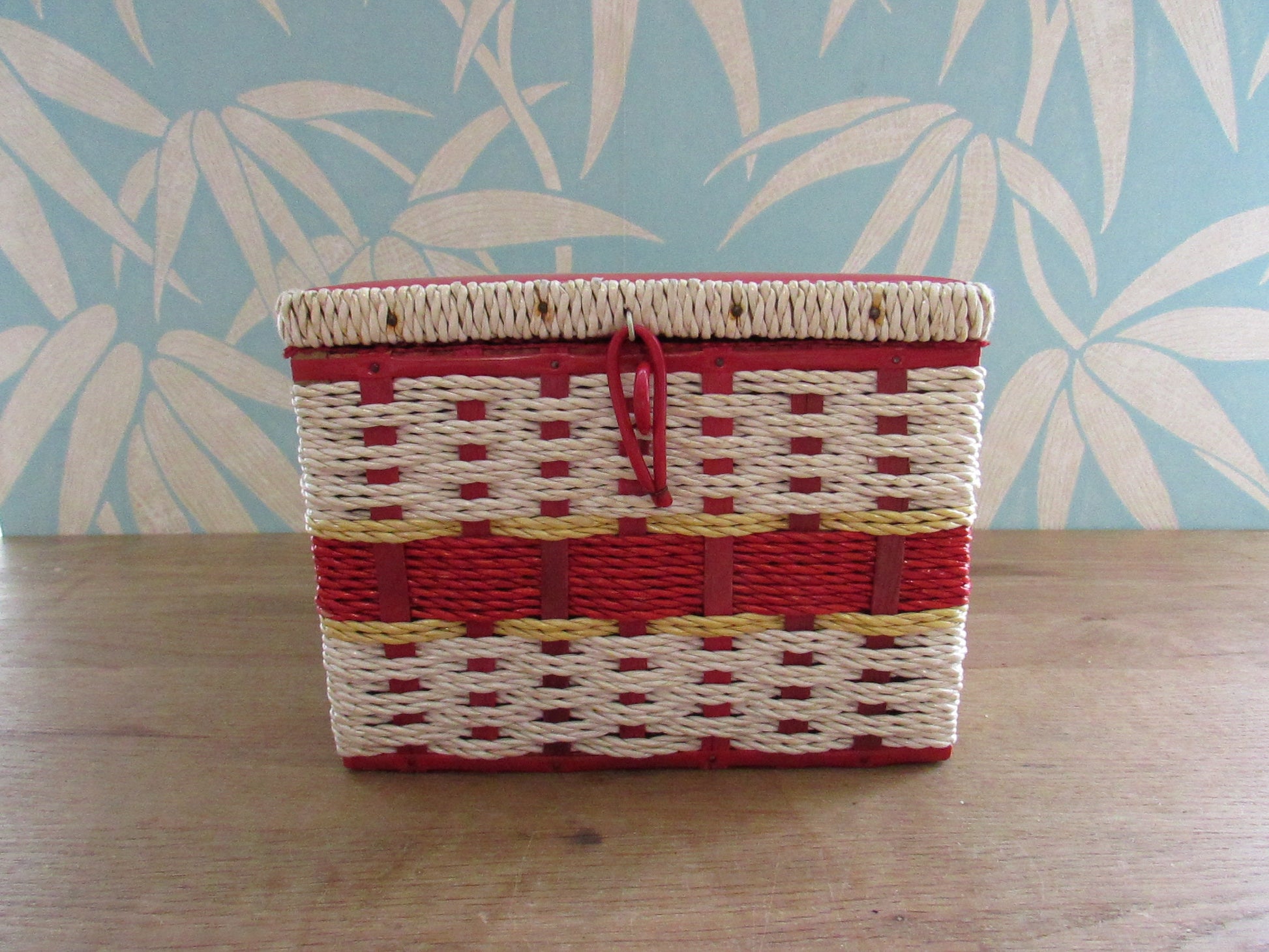 Mid-century red vinyl & wicker sewing box, depicting mother and baby deer