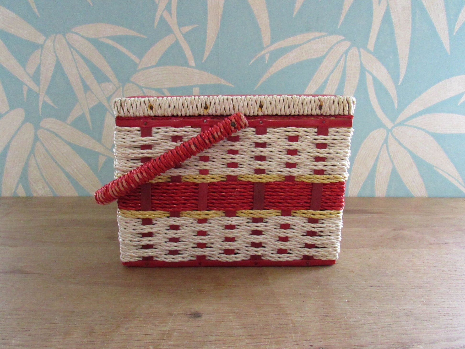 Mid-century red vinyl & wicker sewing box, depicting mother and baby deer