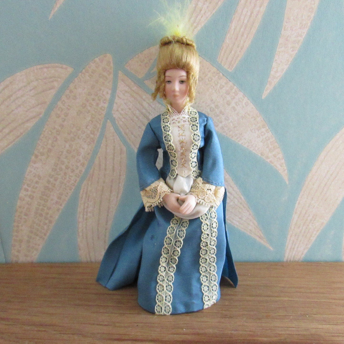 Vintage miniature porcelain doll's house doll in traditional Victorian dress