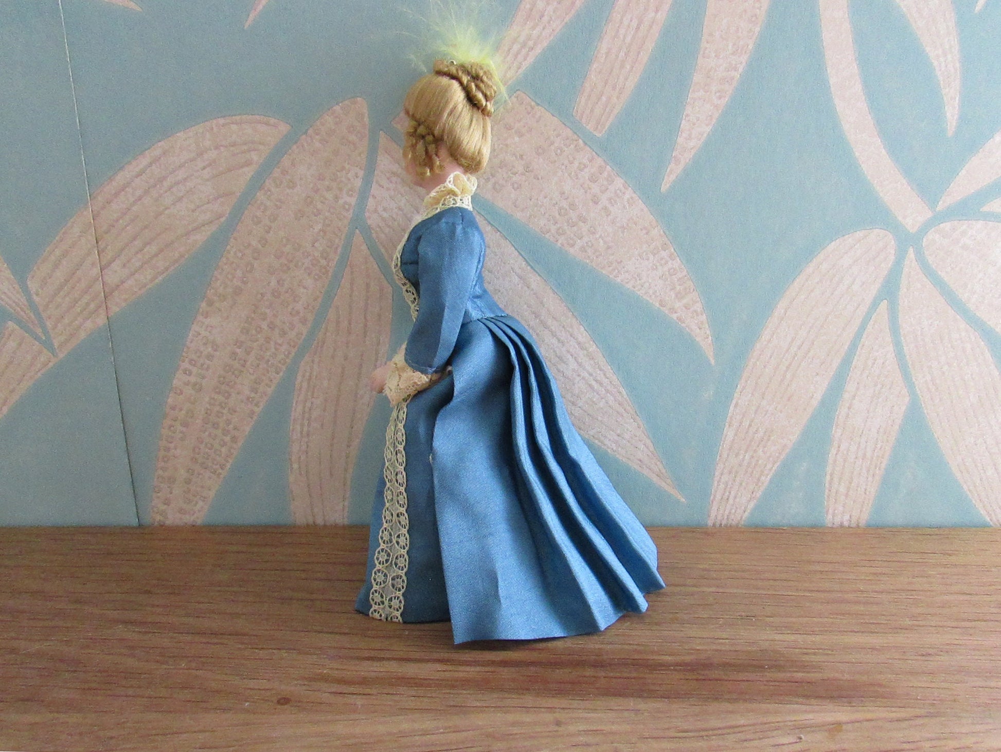 Vintage miniature porcelain doll's house doll in traditional Victorian dress