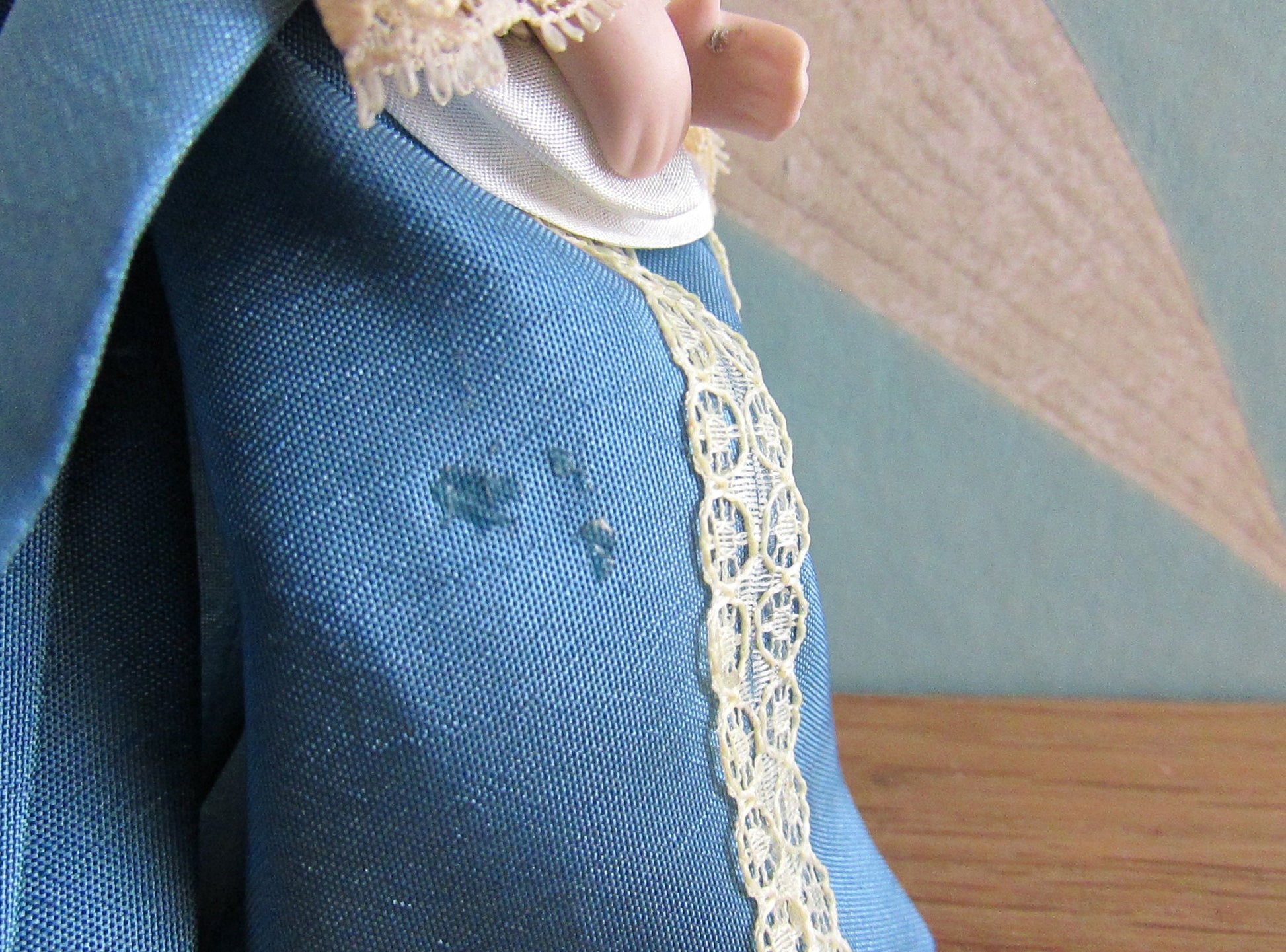 Vintage miniature porcelain doll's house doll in traditional Victorian dress