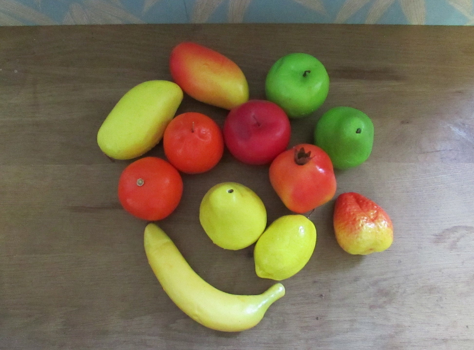 Selection of 12 vintage life-size plastic fruit