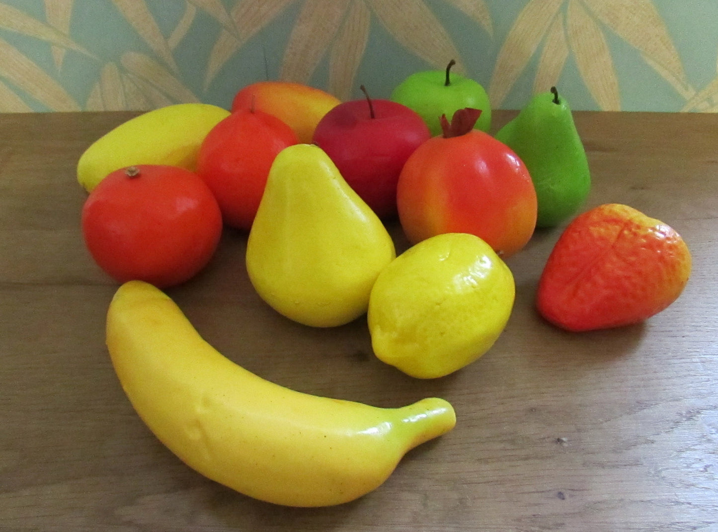 Selection of 12 vintage life-size plastic fruit