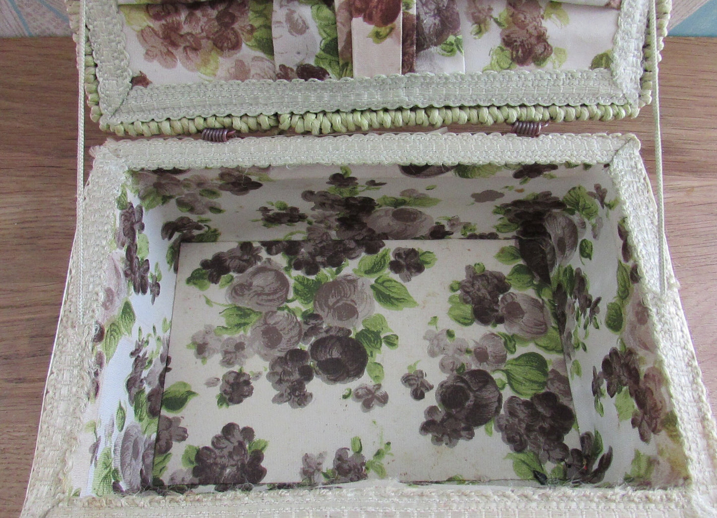 1960s floral plastic top wicker sewing box with fabric-covered lining