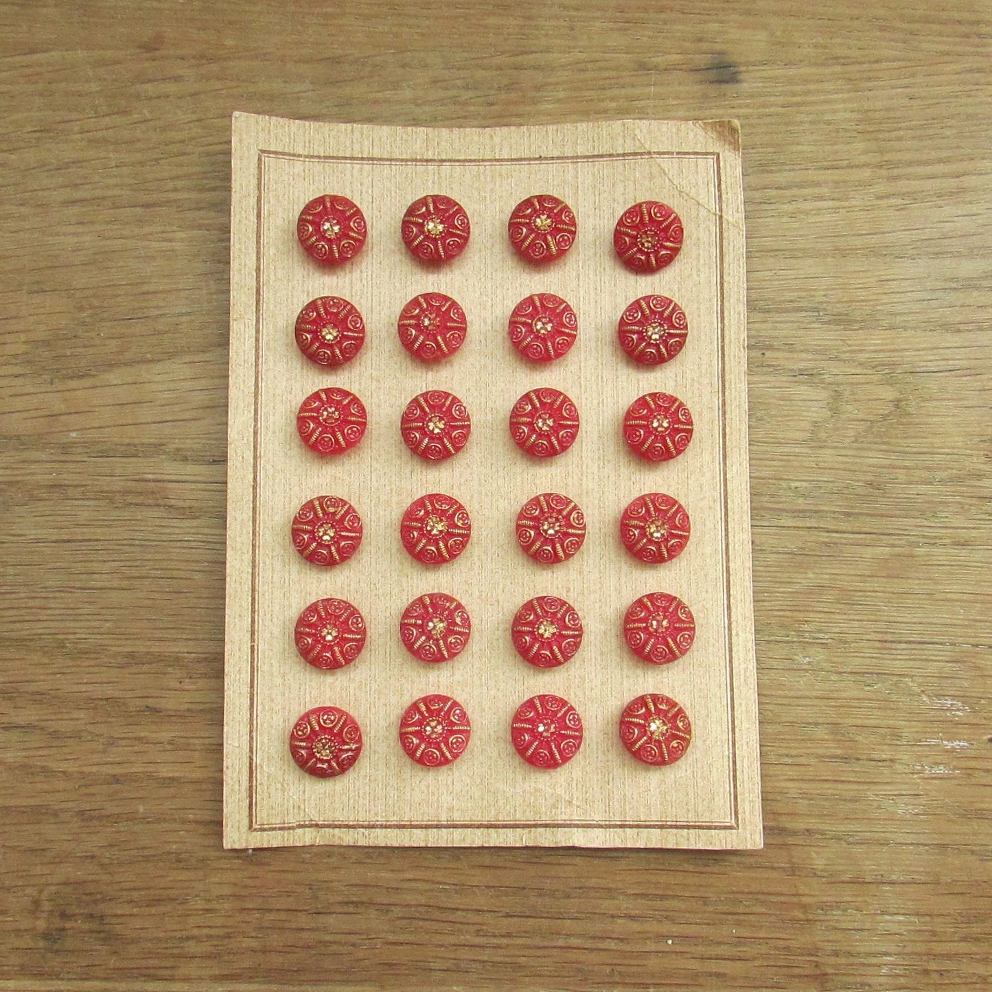 Vintage carded red & gold glass shield buttons x24
