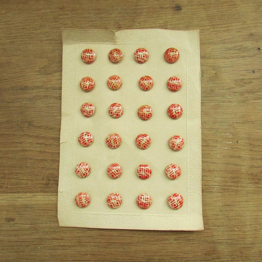 Vintage carded red & white geometric pattern buttons x24