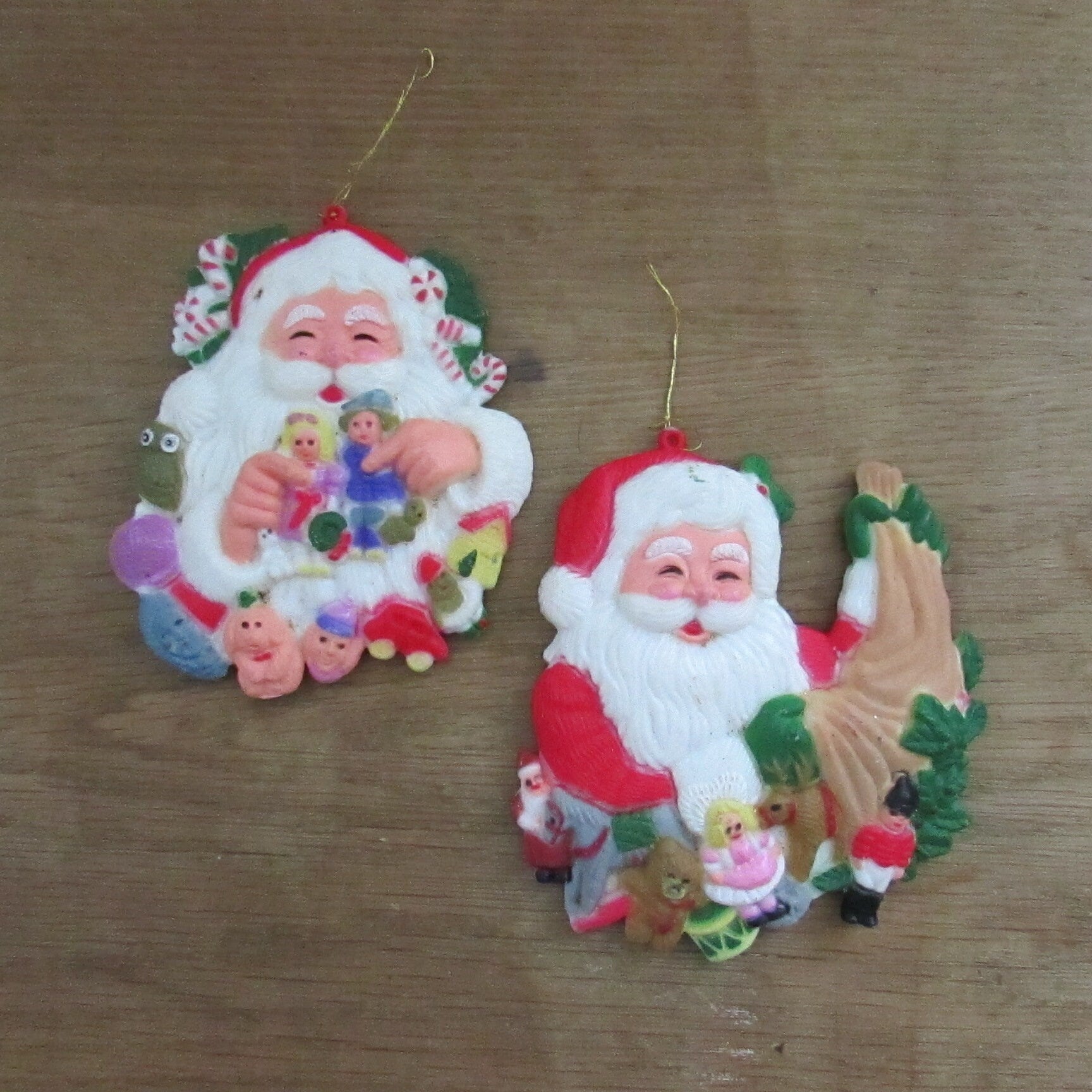 Pair of vintage hard plastic Father Christmas/Santa tree ornaments