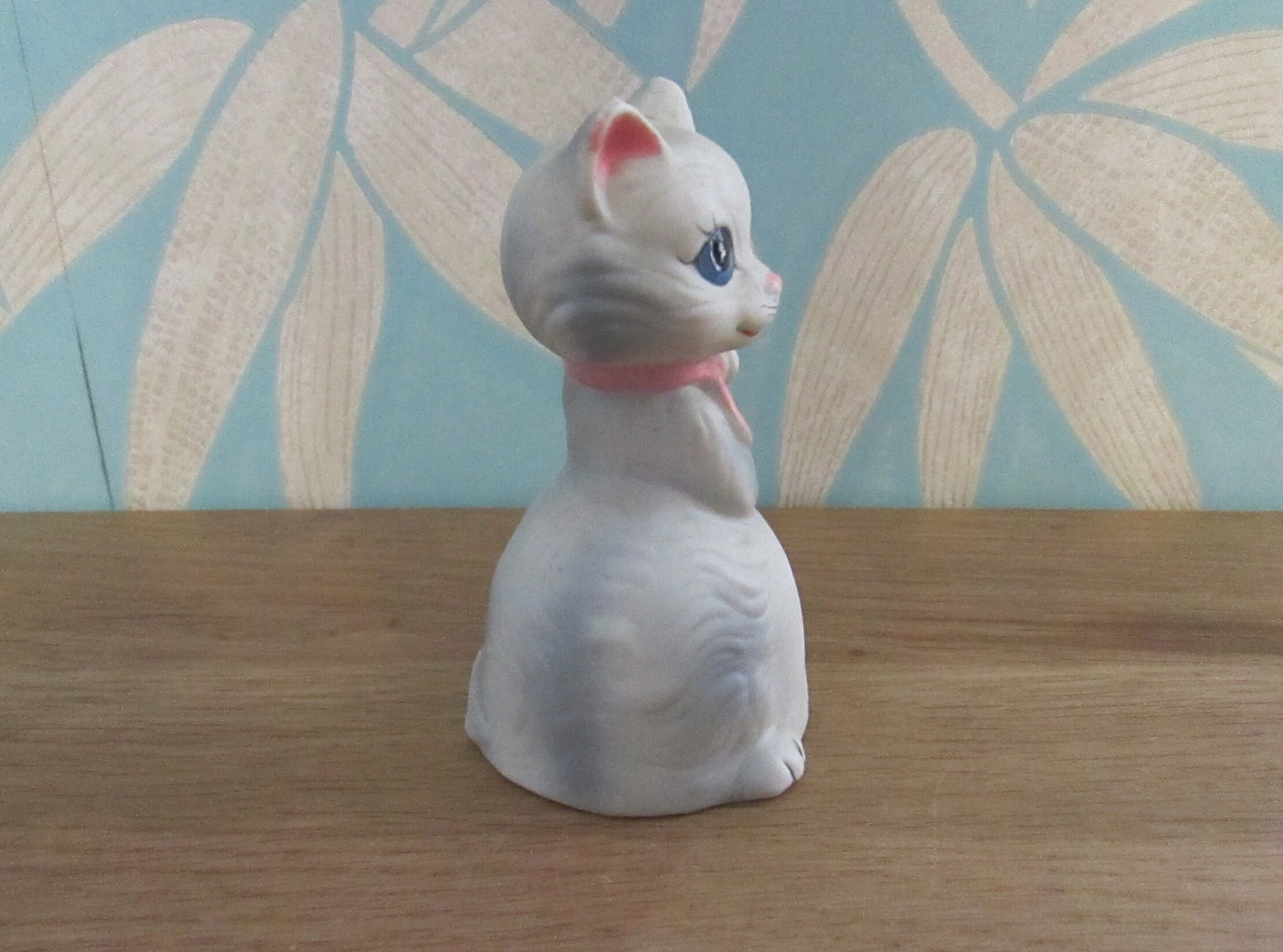Vintage porcelain cat/kitten-shaped bell, pink bow tie detail