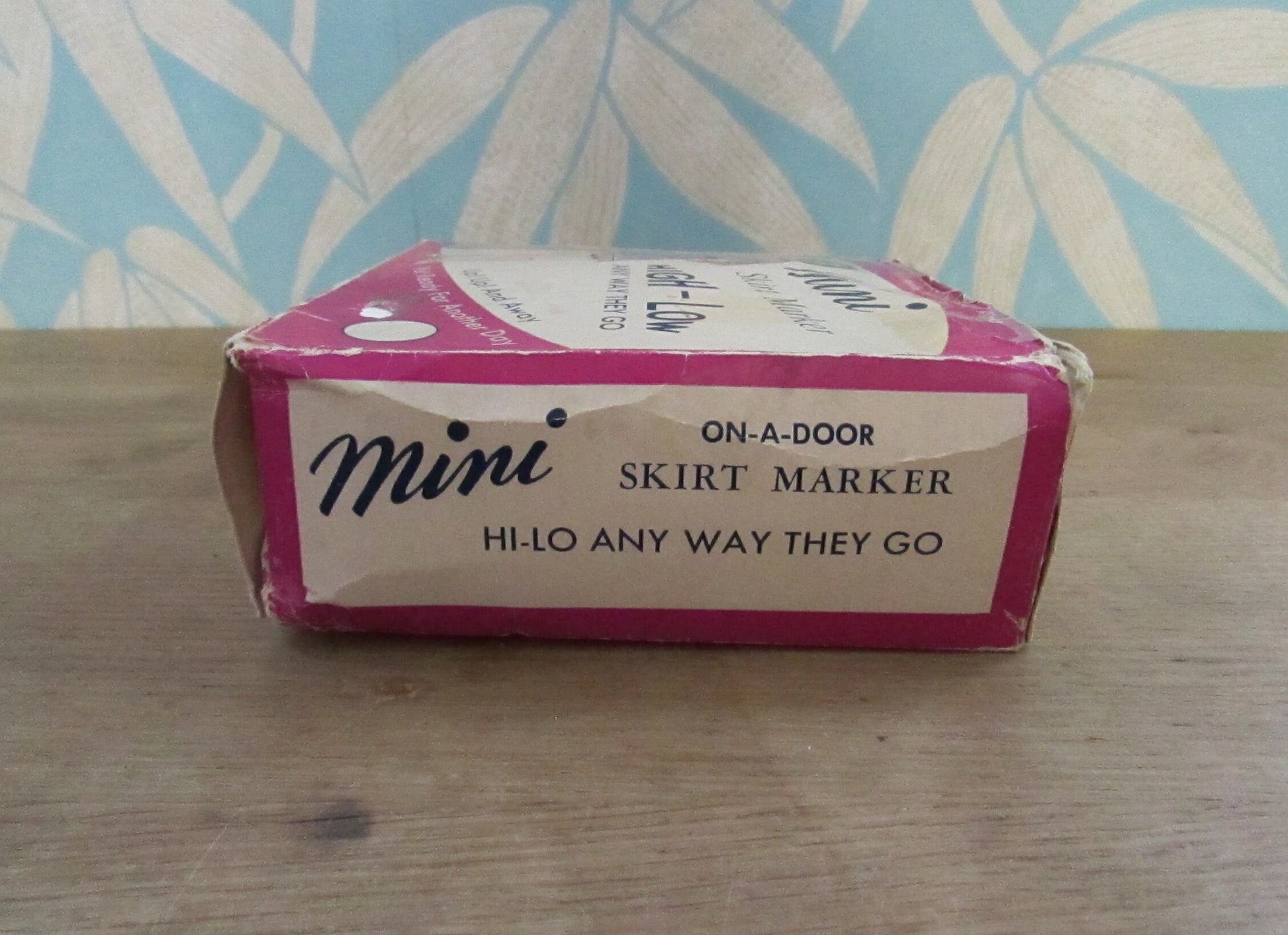 1960s Orco Products 'on-a-door' mini skirt marker with original box