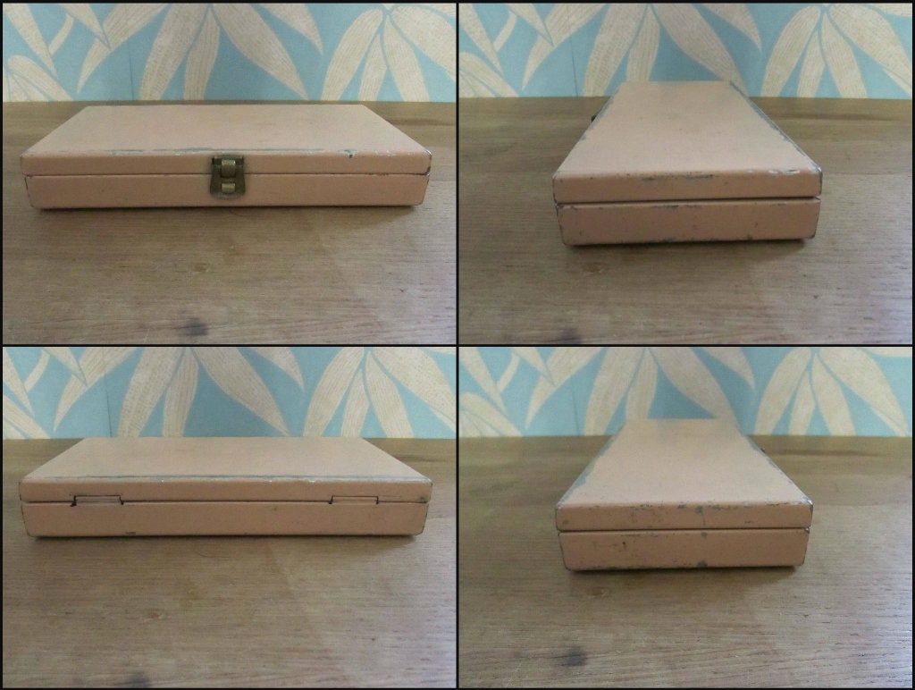 Mid-century travel vanity set in peach-coloured metal case