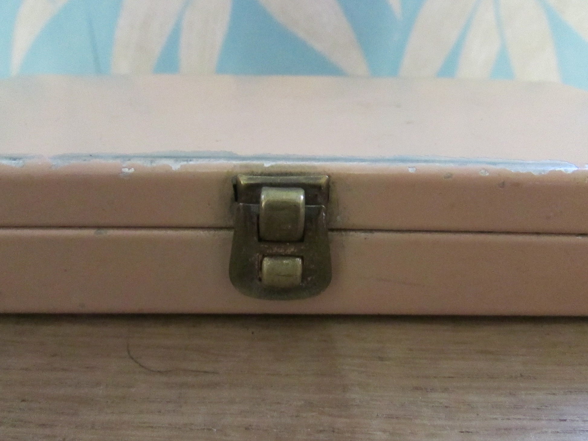 Mid-century travel vanity set in peach-coloured metal case
