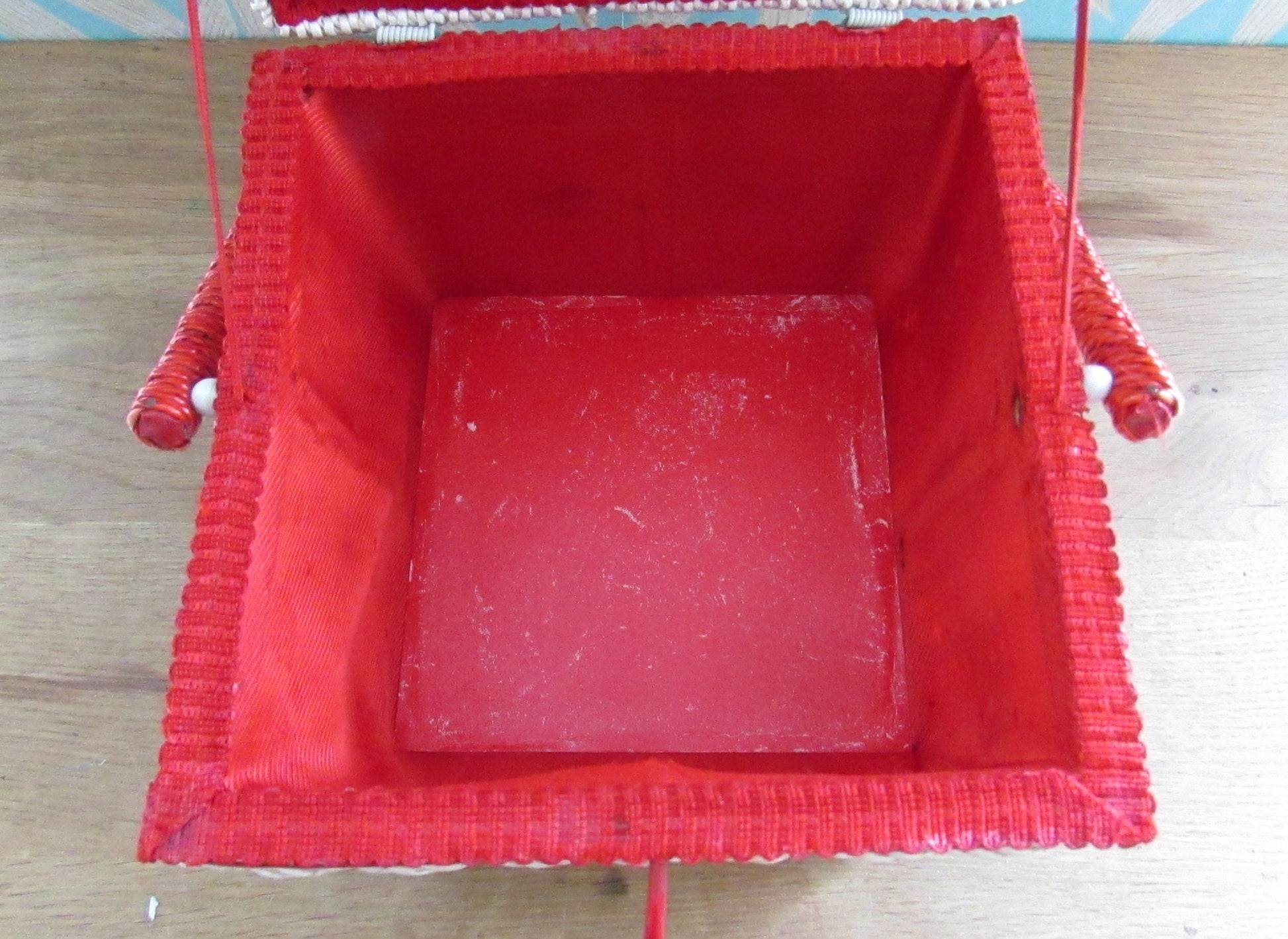 Mid-century red vinyl & wicker sewing box, depicting mother and baby deer