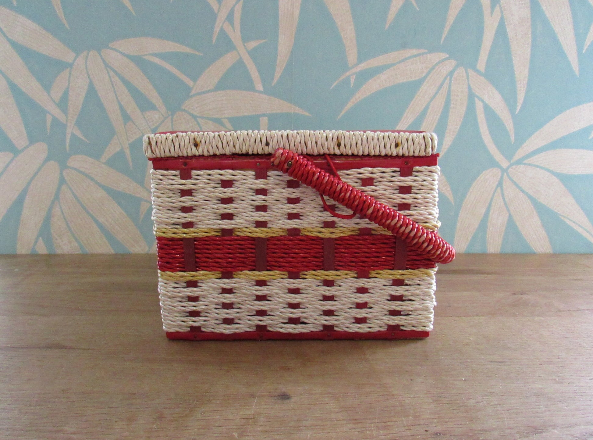 Mid-century red vinyl & wicker sewing box, depicting mother and baby deer