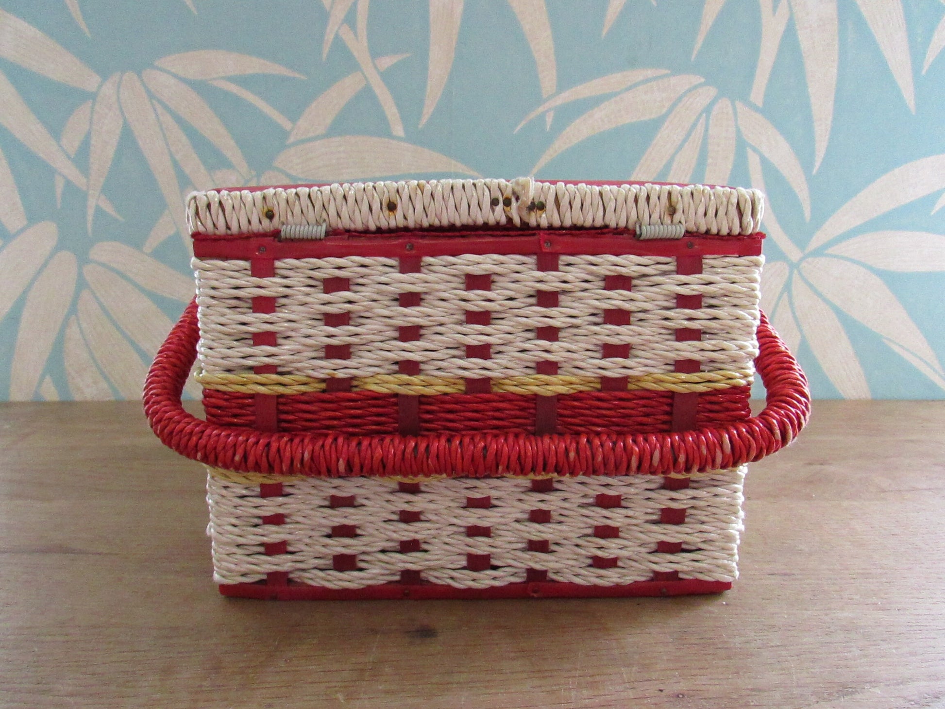 Mid-century red vinyl & wicker sewing box, depicting mother and baby deer