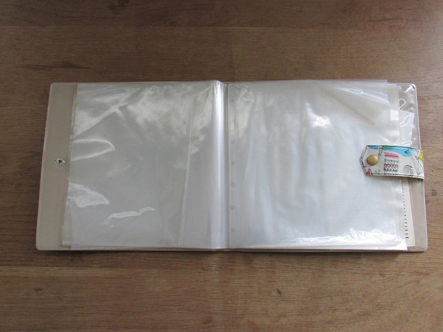 1960s hardcover vinyl record case for 7inch singles, illustrated with ships & hot air balloons