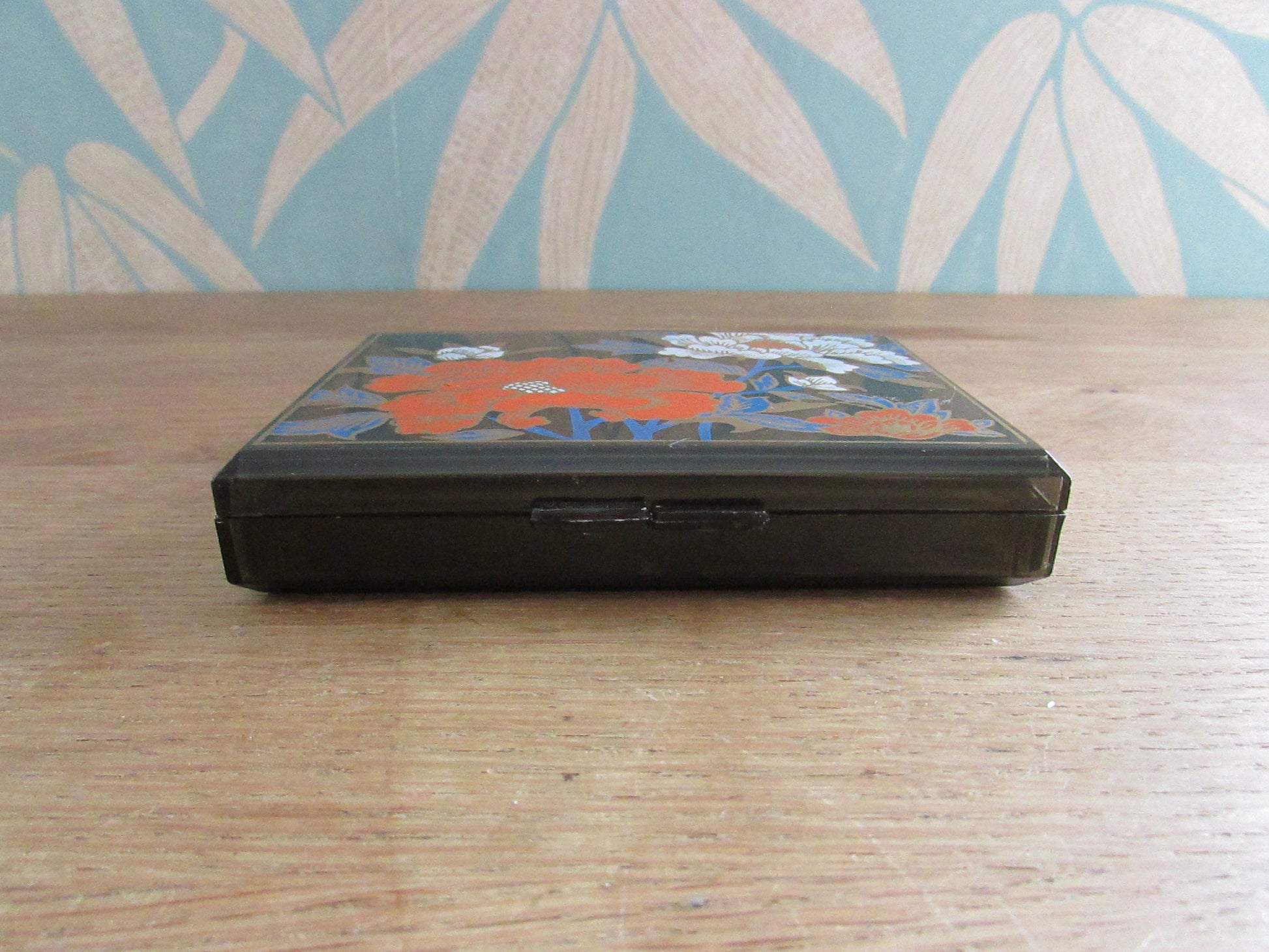 circa. 1980s Chinese lacquered floral plastic tissue box with integral mirror