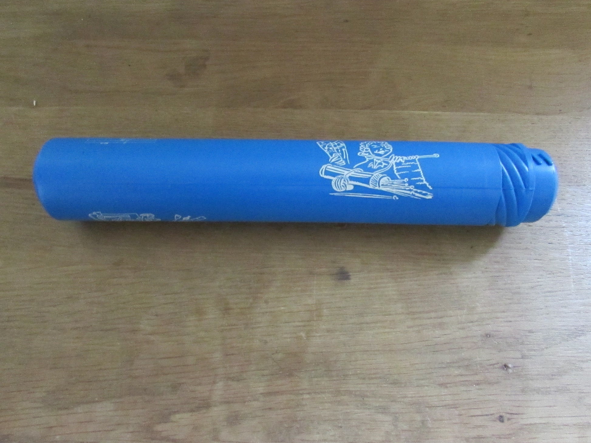 Vintage blue plastic certificate holder tube with cartoon motif