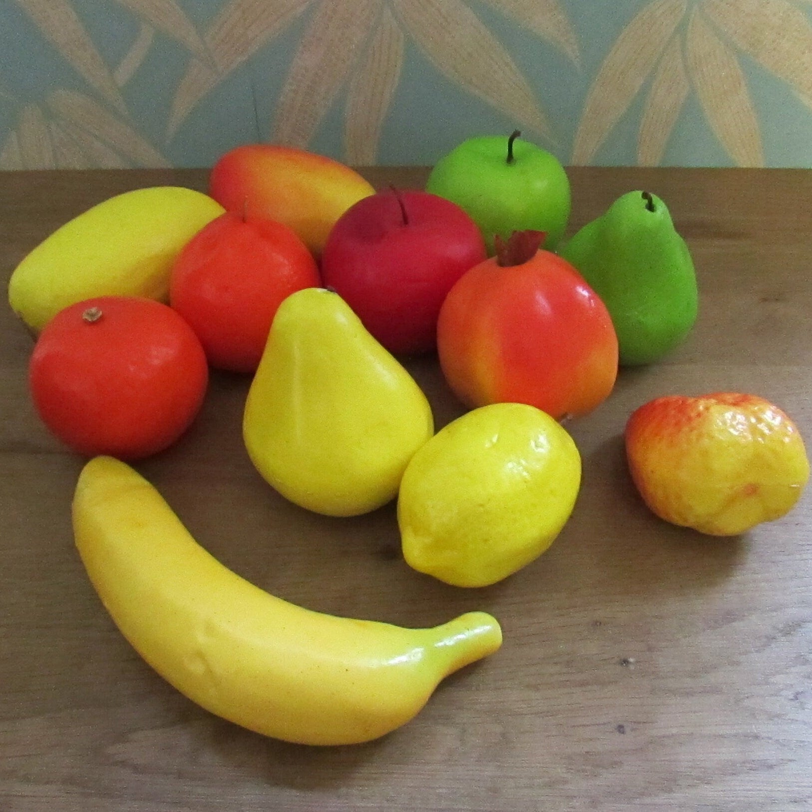 Selection of 12 vintage life-size plastic fruit