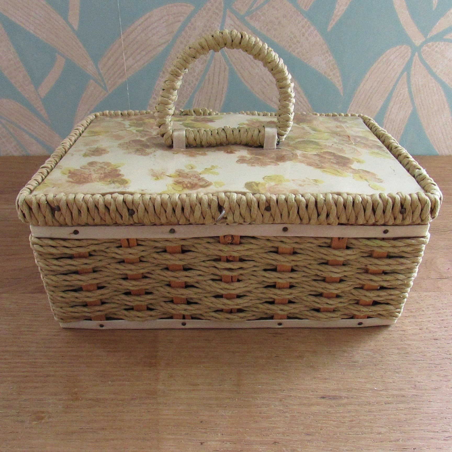 1960s floral plastic top wicker sewing box with fabric-covered lining