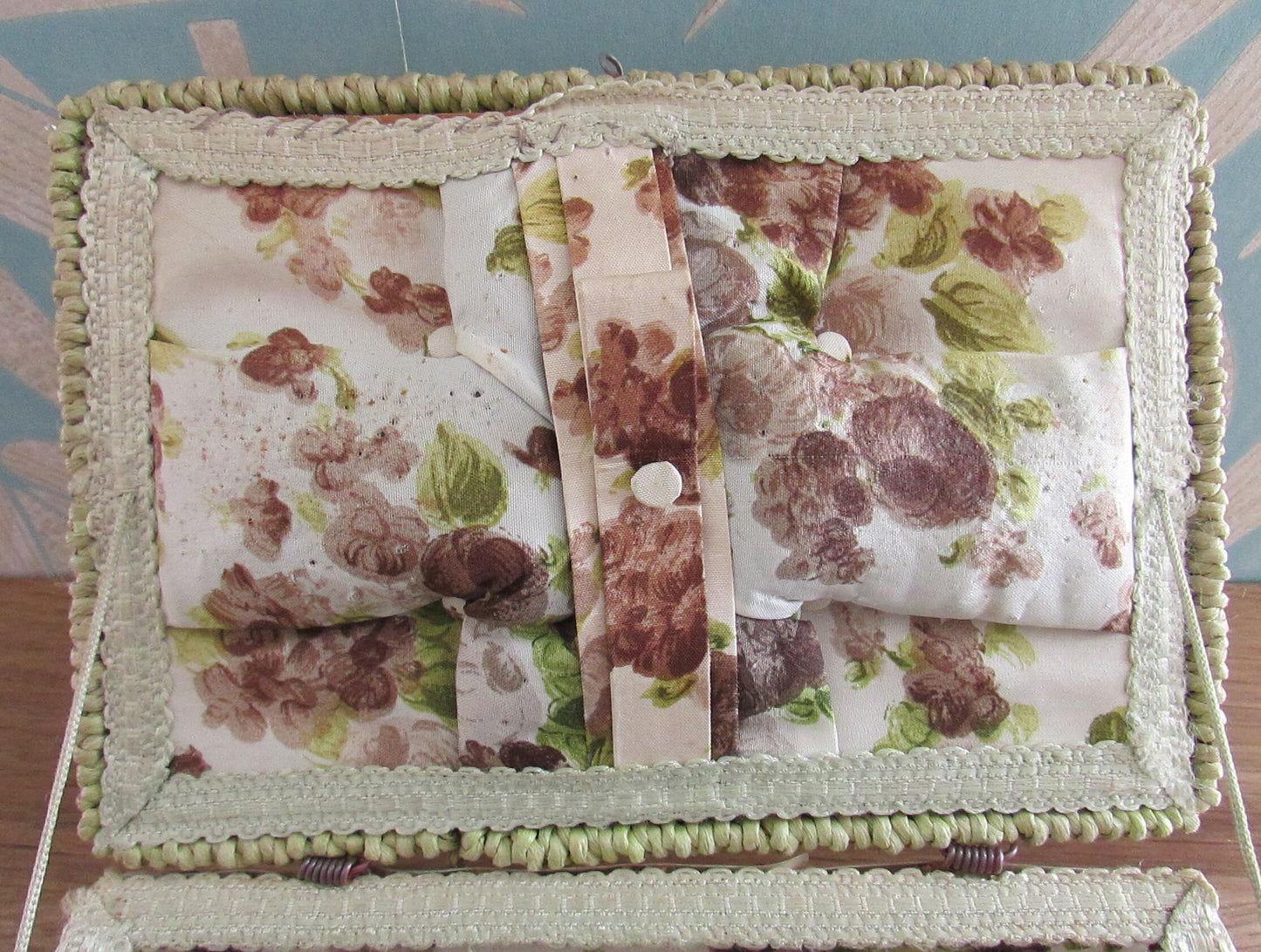 1960s floral plastic top wicker sewing box with fabric-covered lining