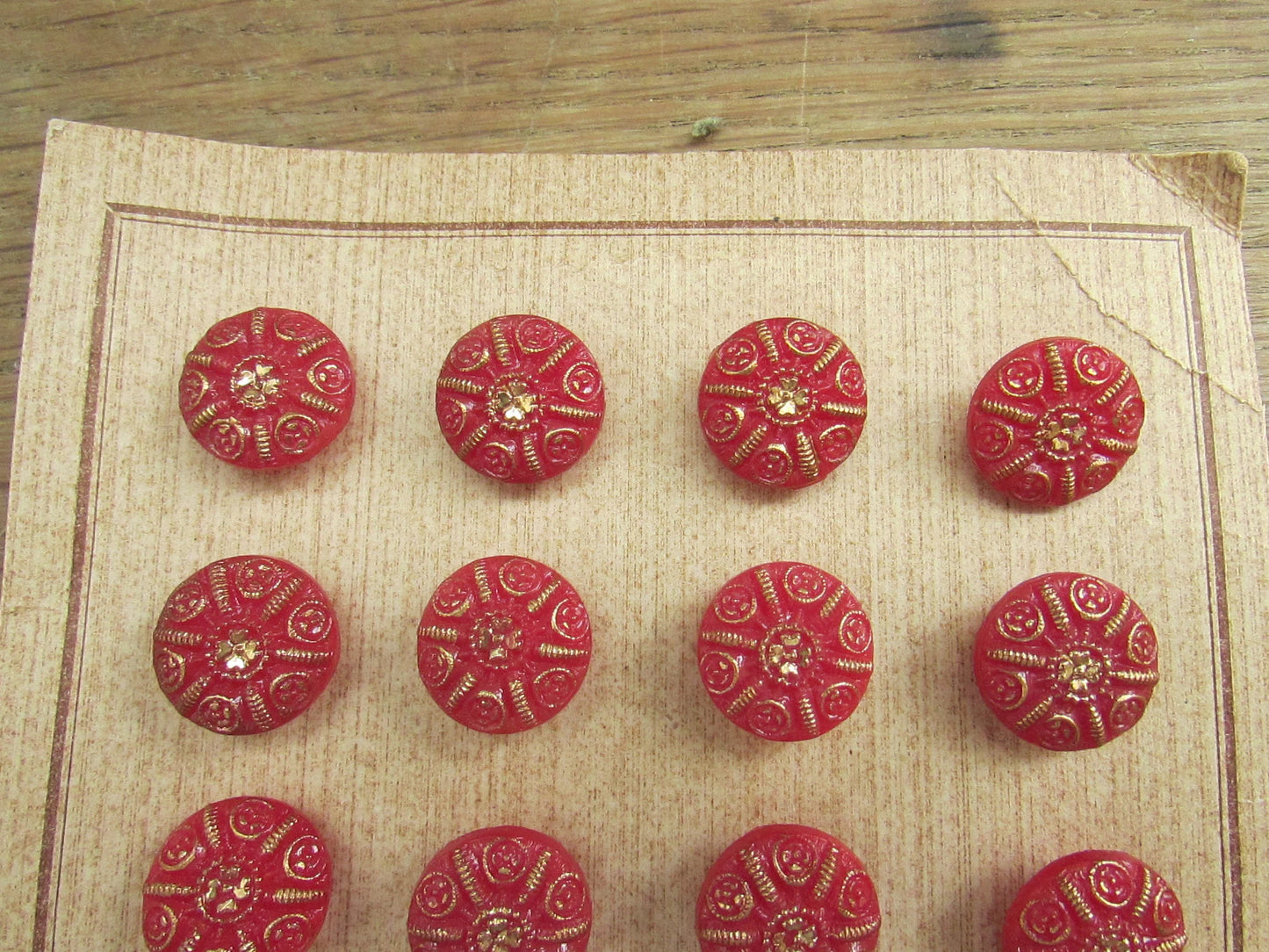 Vintage carded red & gold glass shield buttons x24