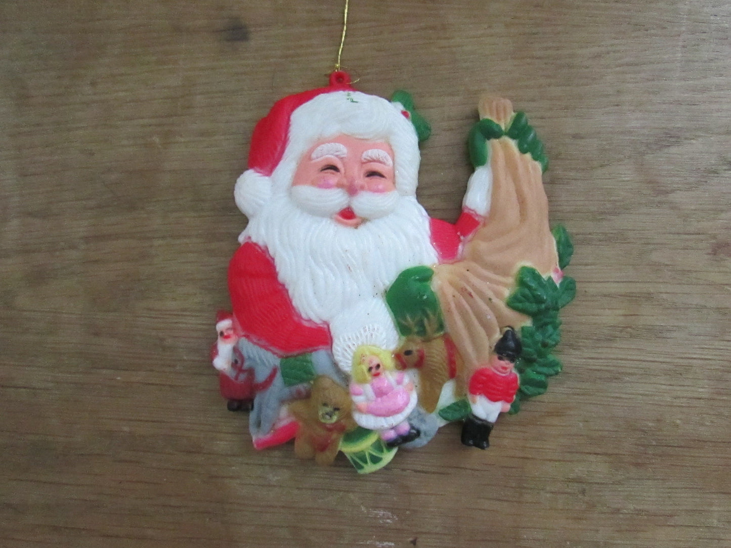 Pair of vintage hard plastic Father Christmas/Santa tree ornaments