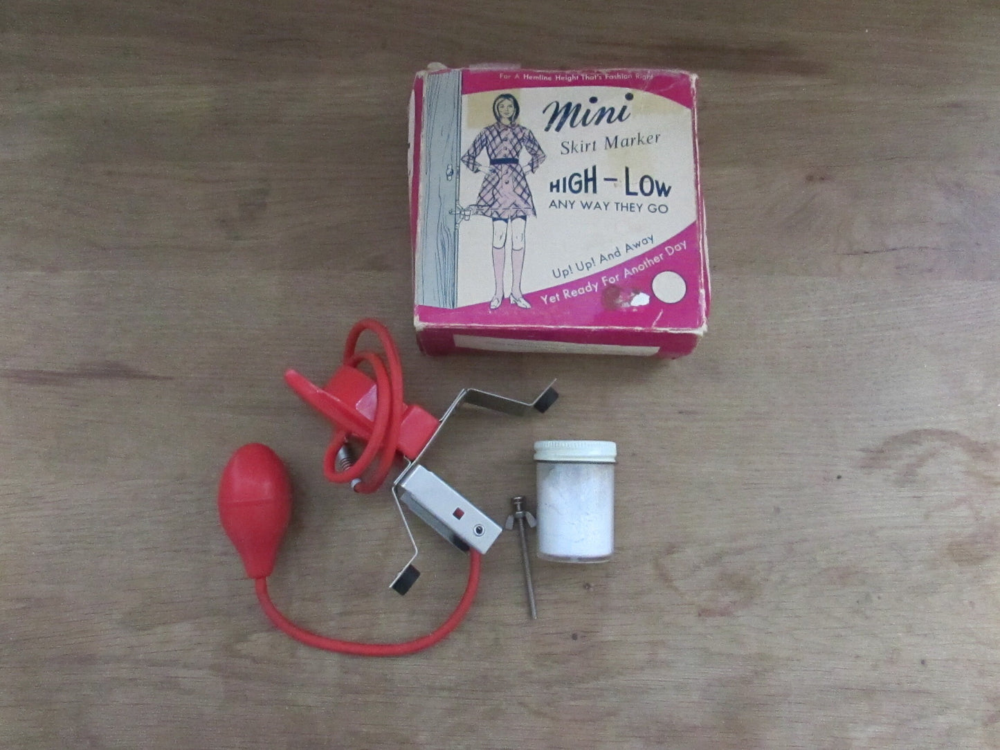 1960s Orco Products 'on-a-door' mini skirt marker with original box
