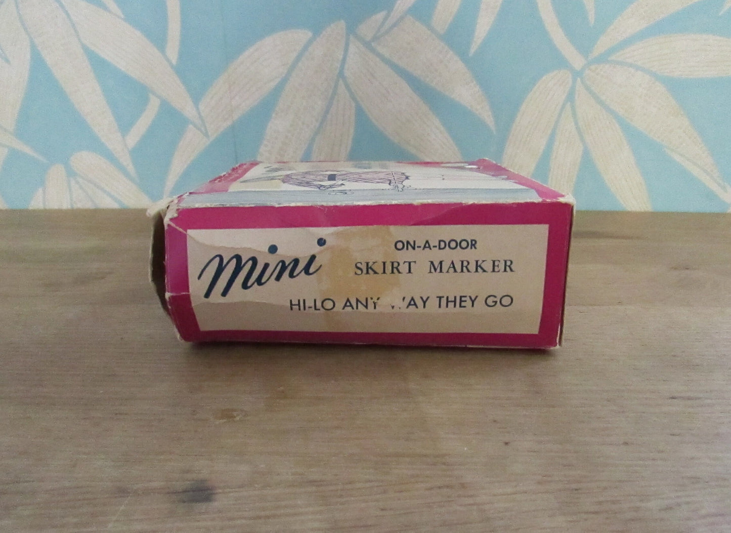 1960s Orco Products 'on-a-door' mini skirt marker with original box