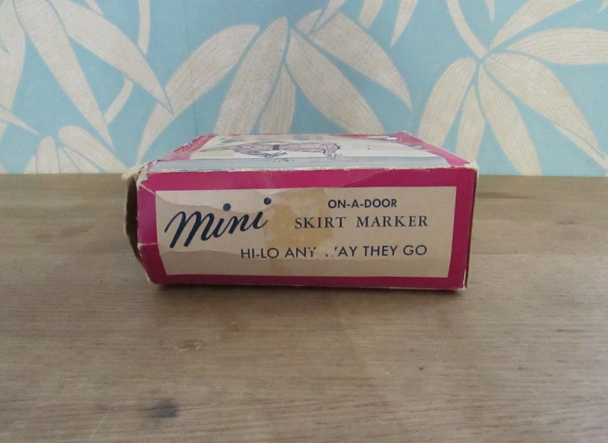 1960s Orco Products 'on-a-door' mini skirt marker with original box