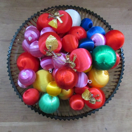 Mid-century jewel-coloured spun satin/silk bauble bundle, including apples with gold leaves