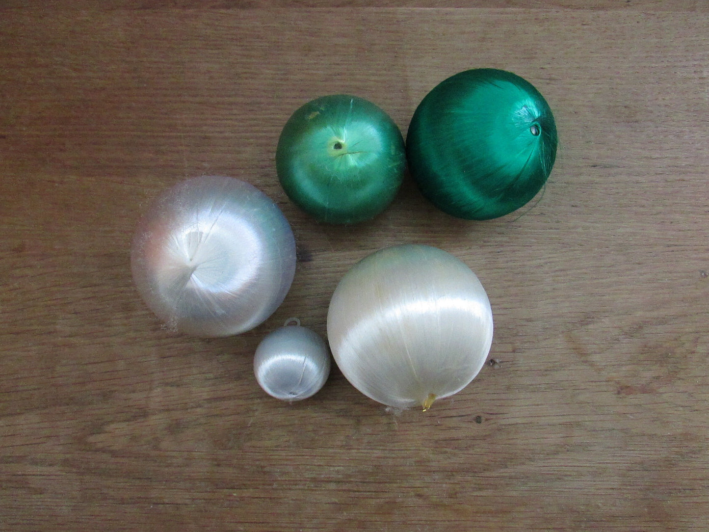 Mid-century jewel-coloured spun satin/silk bauble bundle, including apples with gold leaves