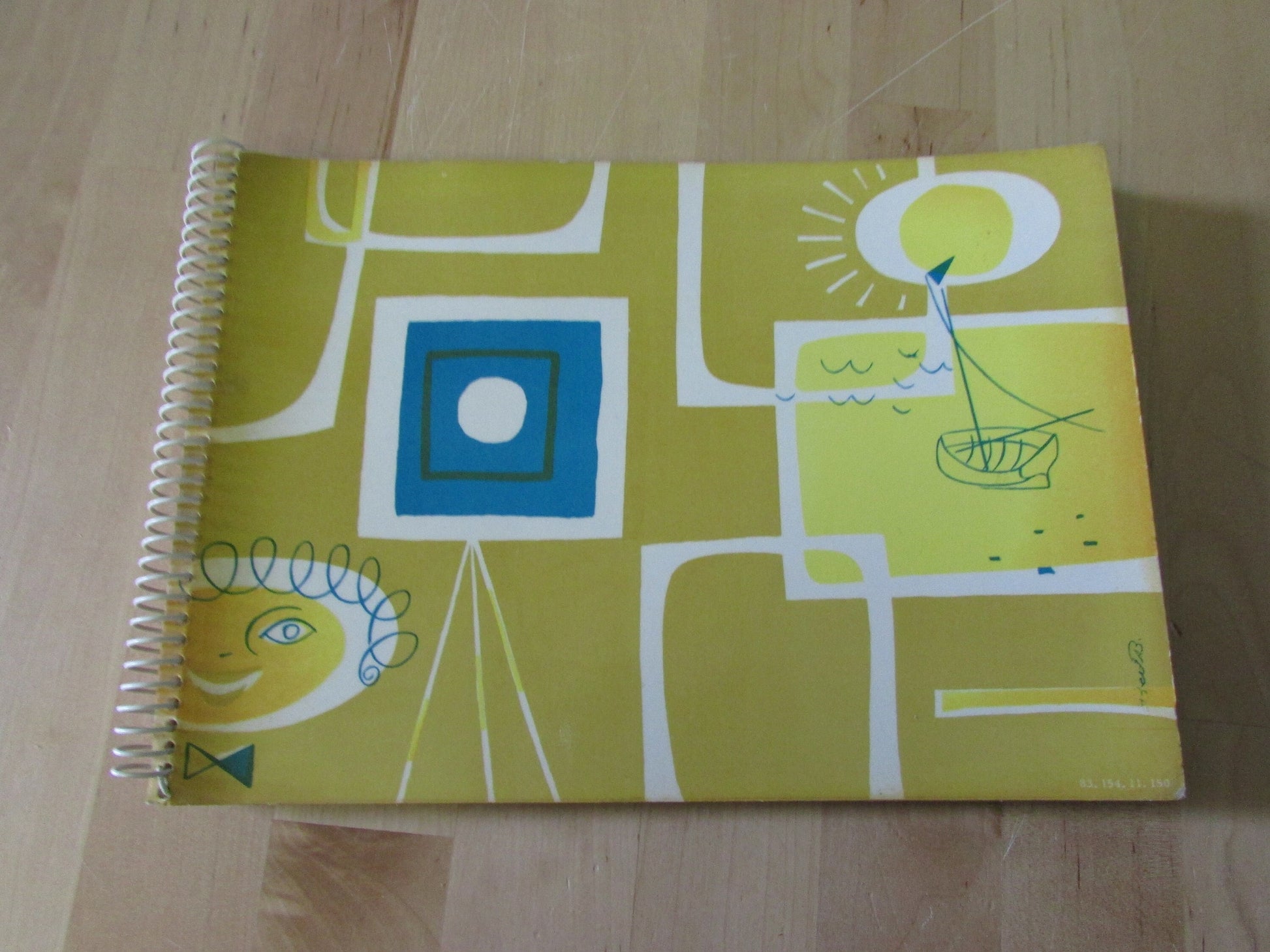 Mid-century photo album, abstract sun & boat motif cover, botanical patterned dividing sheets