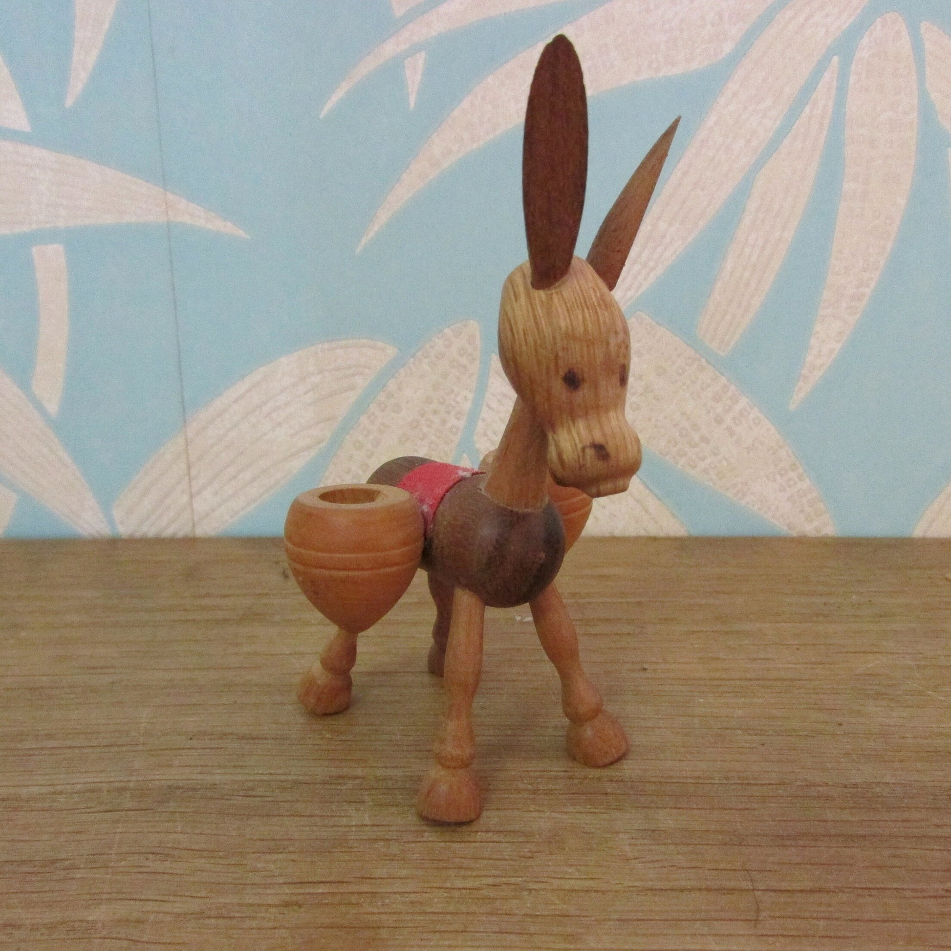 1960s wooden donkey figurine with panniers