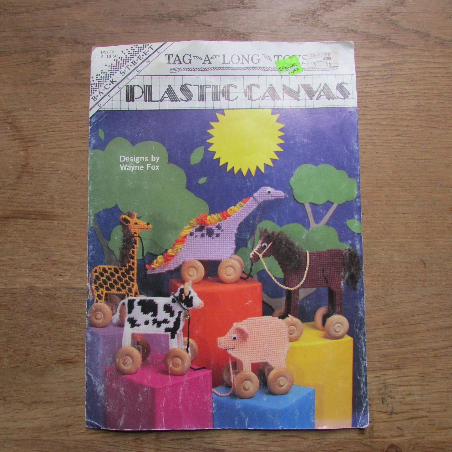 1992 Back Street Designs plastic canvas Tag-a-Long-Toys, designed by Wayne Fox