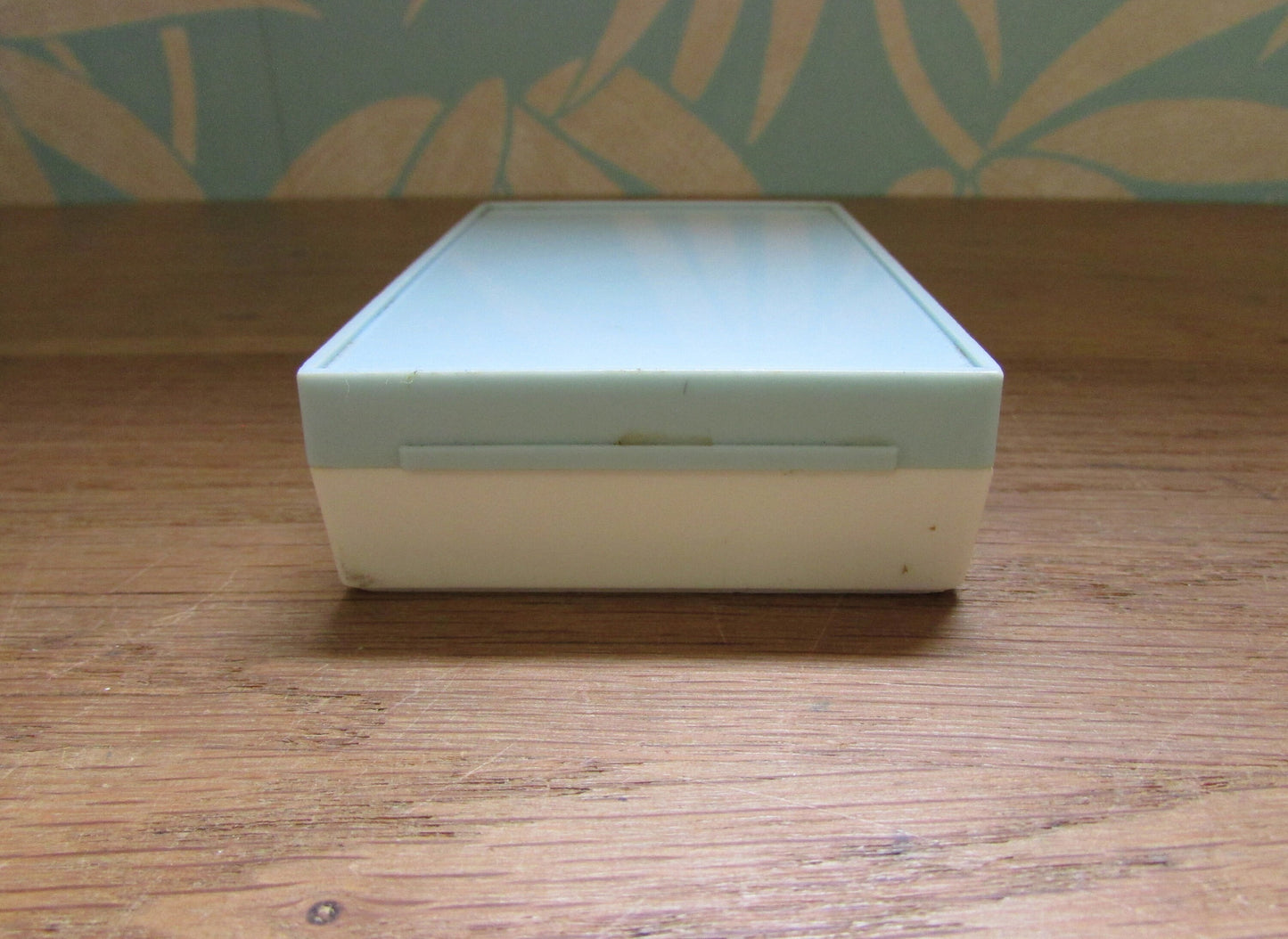 Vintage playing cards in plastic box
