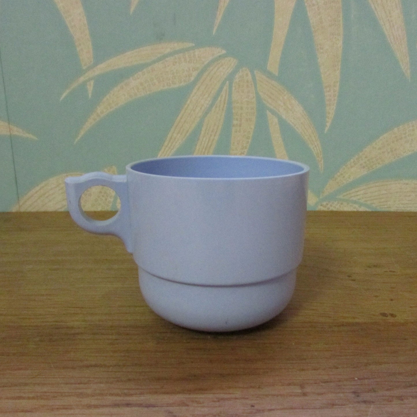 Set of four 1960s pale blue plastic stacking picnic mugs